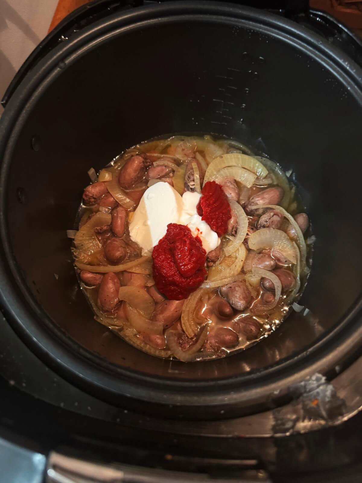 Add yogurt and tomato paste