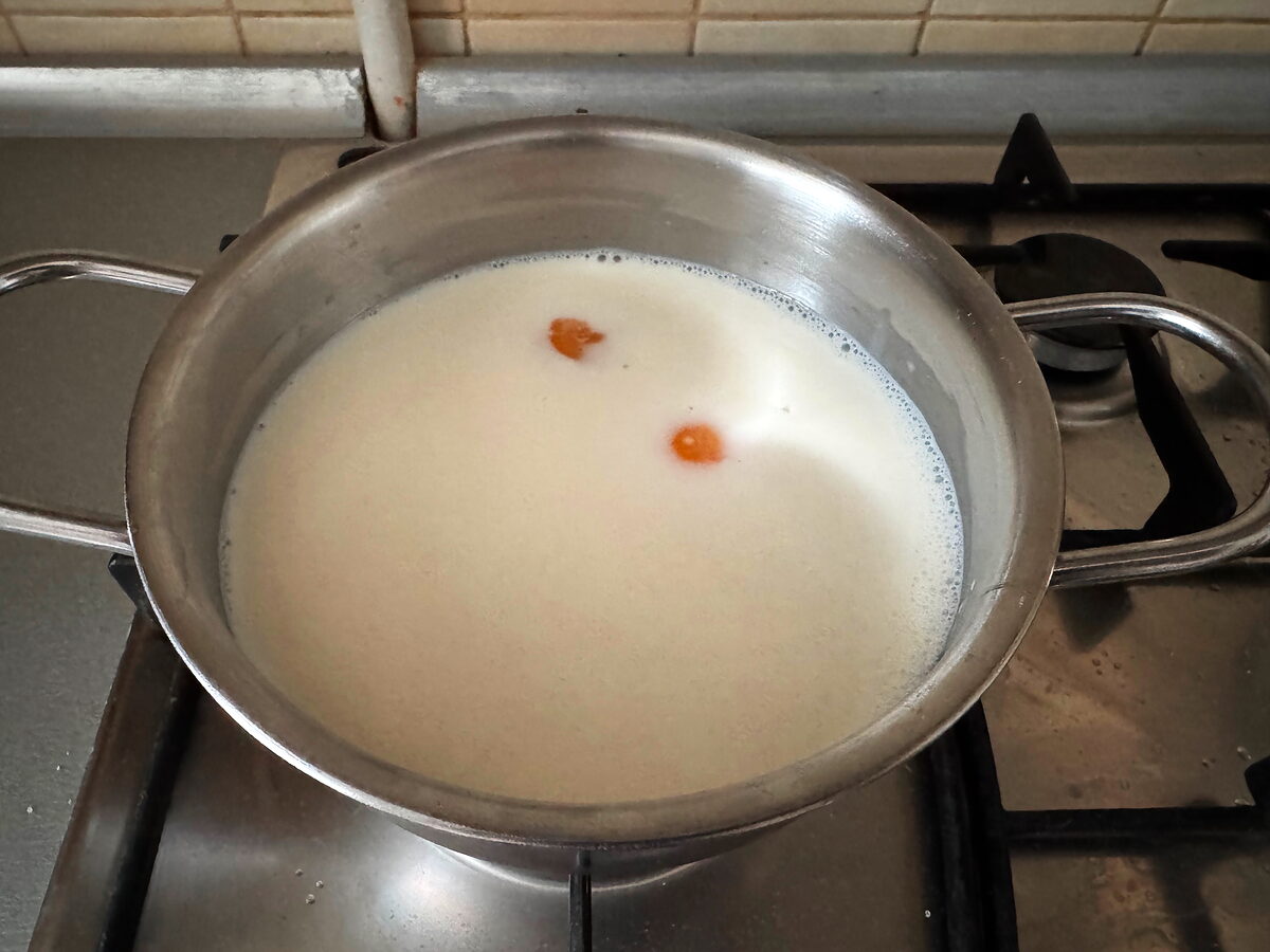 Whisk in the egg yolks