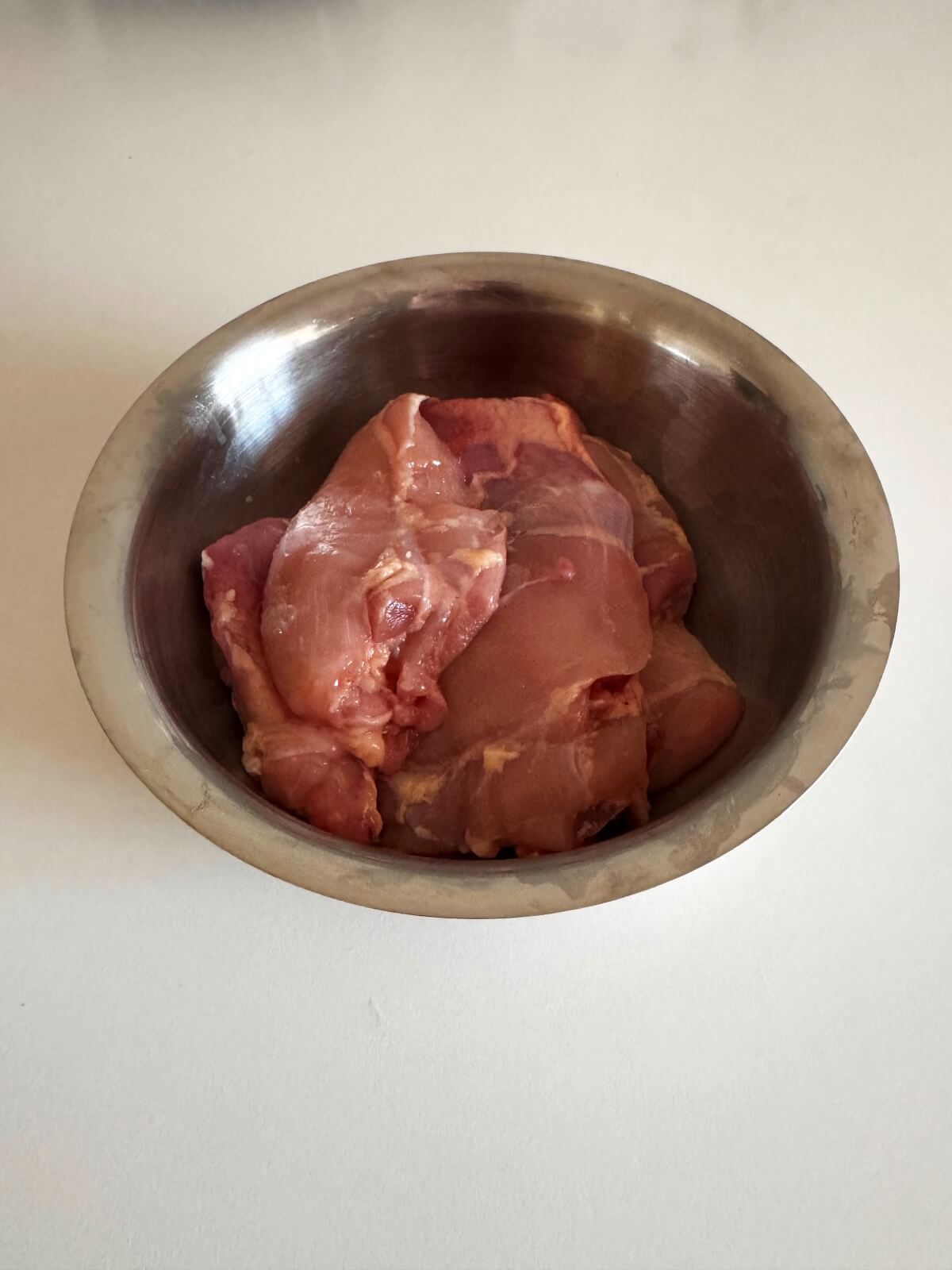 Place thighs in a bowl